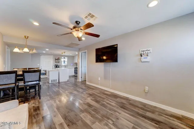 a view of a livingroom with a workspace