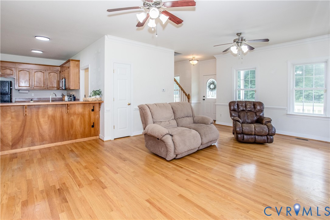 20411 Horseshoe Road Carson, VA 23830 - Photo 24 of 35 Open-concept living area featuring wood-finish flo
