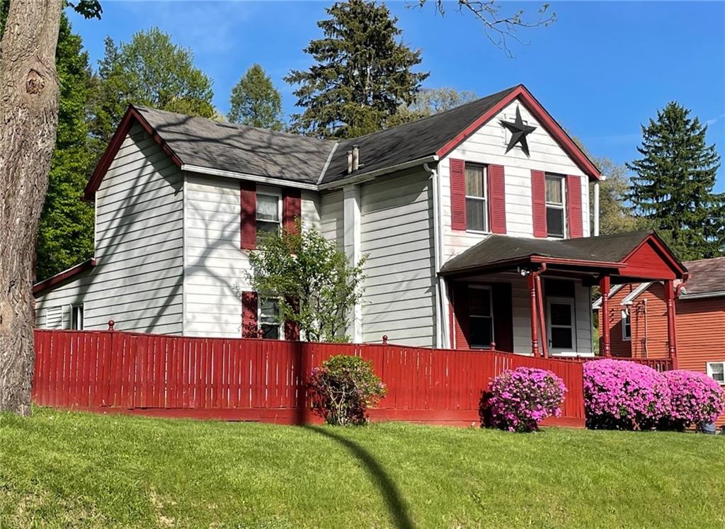 a front view of house with yard