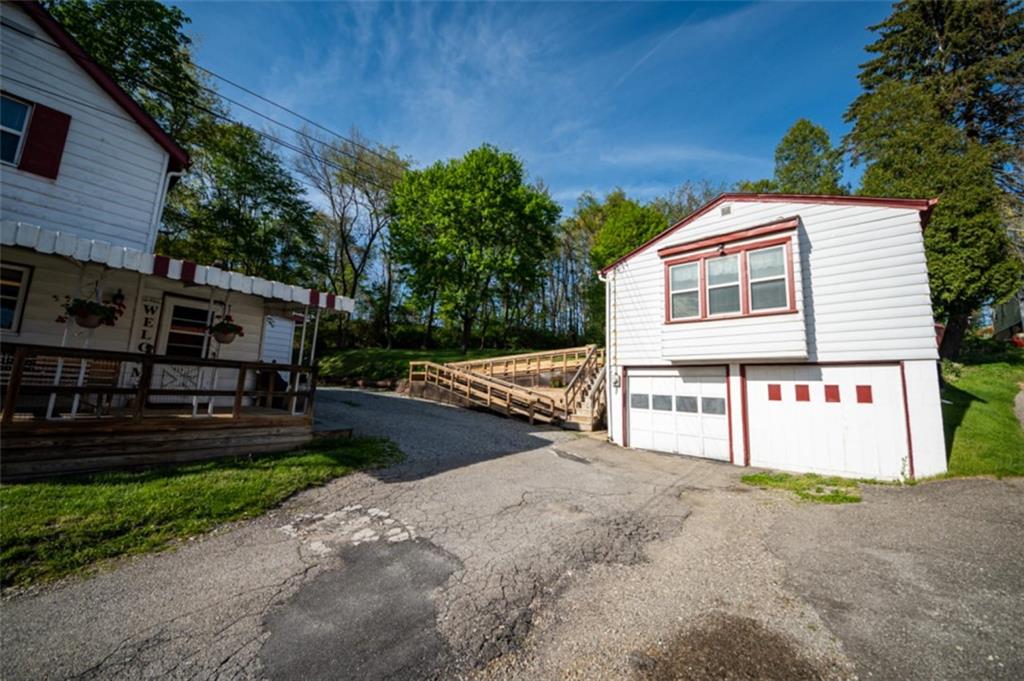 222 Reis Run Road Pittsburgh, PA 15237 - Photo 14 of 25 a view of house with outdoor space and parking