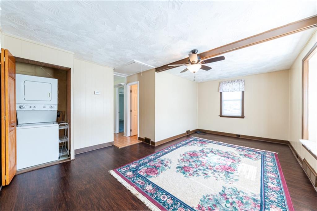 222 Reis Run Road Pittsburgh, PA 15237 - Photo 17 of 25 a view of a room with window and wooden floor