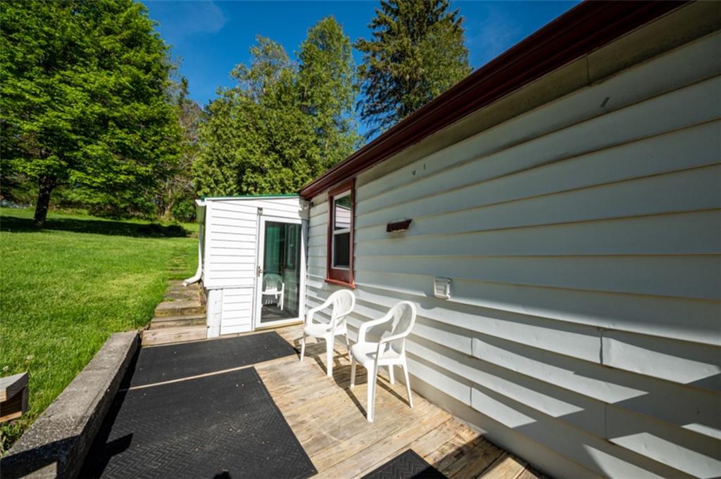 222 Reis Run Road Pittsburgh, PA 15237 - Photo 20 of 25 a view of a patio with a table chairs and backyard
