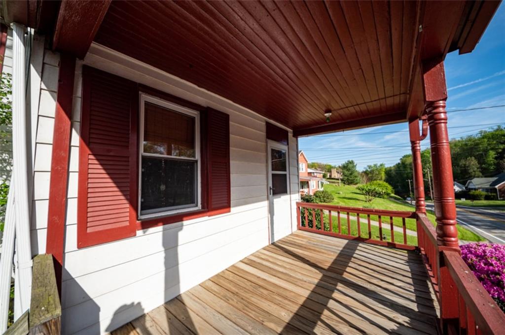 222 Reis Run Road Pittsburgh, PA 15237 - Photo 2 of 25 a view of a balcony with wooden floor