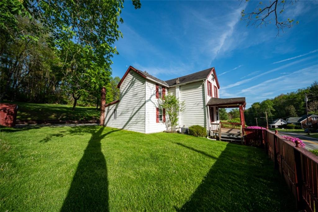 222 Reis Run Road Pittsburgh, PA 15237 - Photo 24 of 25 a view of a house with a yard deck and a garden