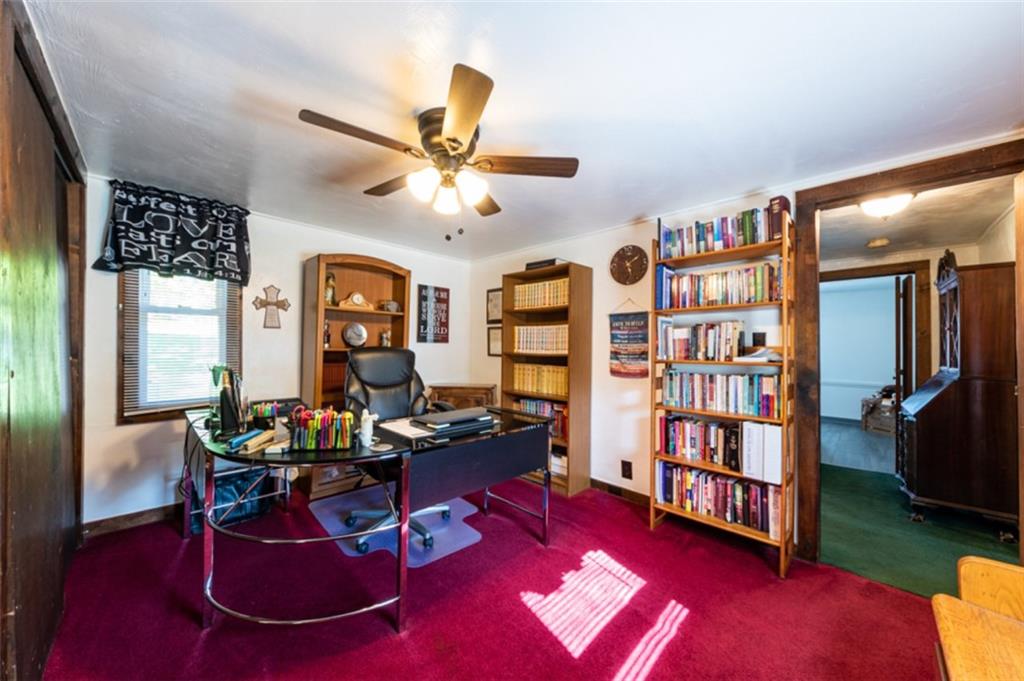 222 Reis Run Road Pittsburgh, PA 15237 - Photo 8 of 25 a living room with furniture gym equipment and a rug