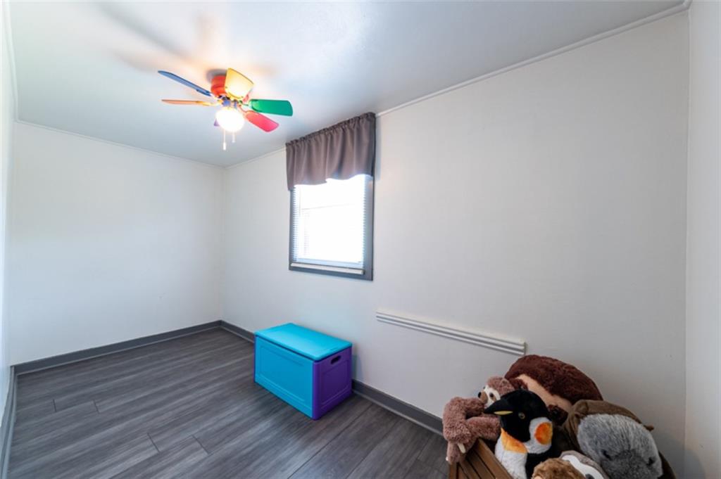 222 Reis Run Road Pittsburgh, PA 15237 - Photo 9 of 25 a room with toys and a wooden floor