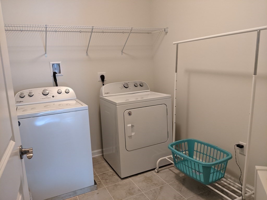 70 Trotter Road, Unit 312 Weymouth, MA 02190 - Photo 18 of 18 a utility room with dryer and washer
