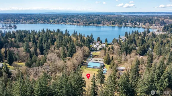 a view of lake and houses with outdoor space