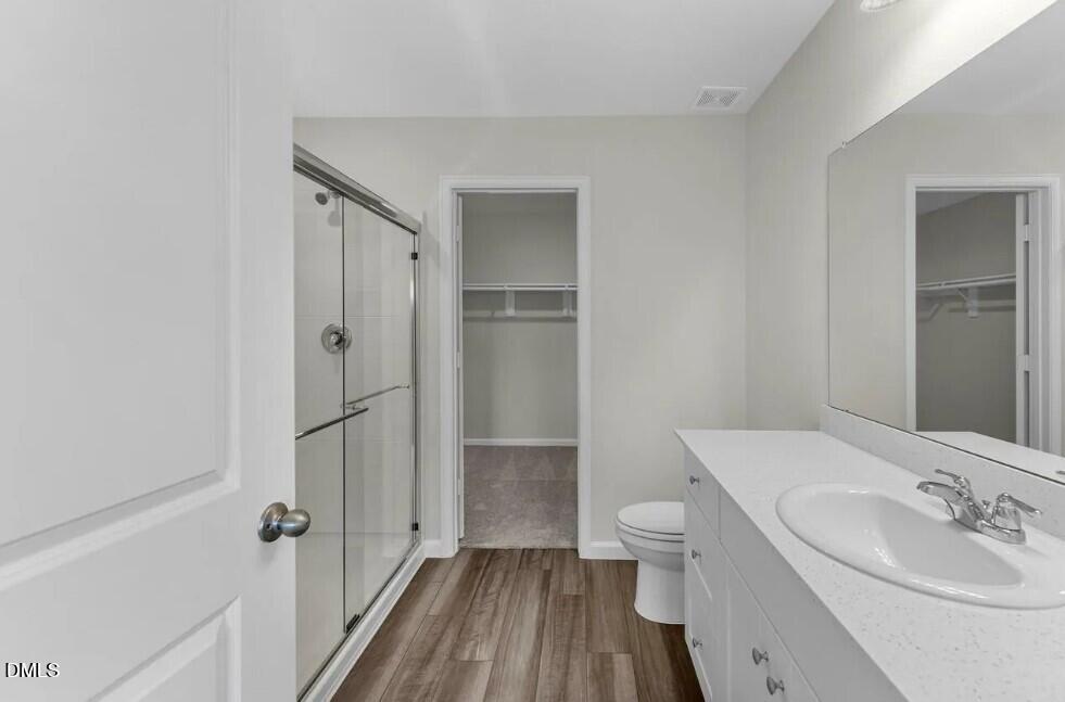 660 Essex Road Nashville, NC 27856 - Photo 17 of 22 a bathroom with a sink a toilet and shower