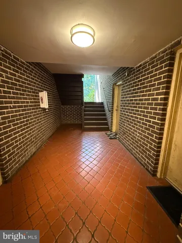 a view of empty room with windows