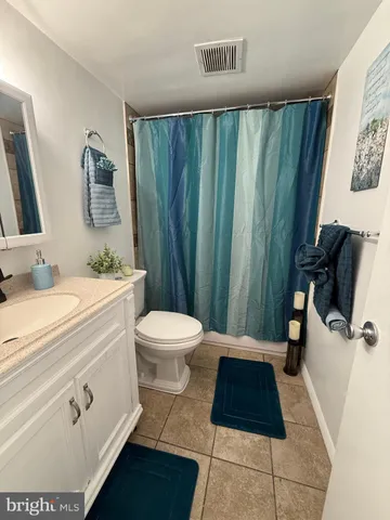 a view of a livingroom with wooden floor