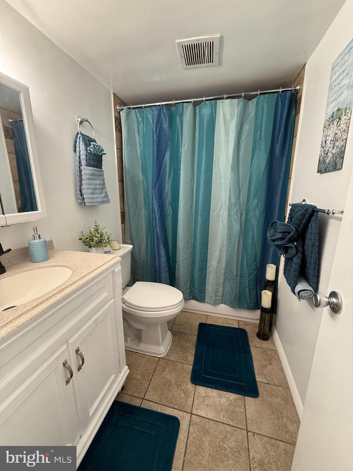 10244 Prince Place, Unit 21T3 Upper Marlboro, MD 20774 - Photo 31 of 64 a bathroom with a toilet a sink and view