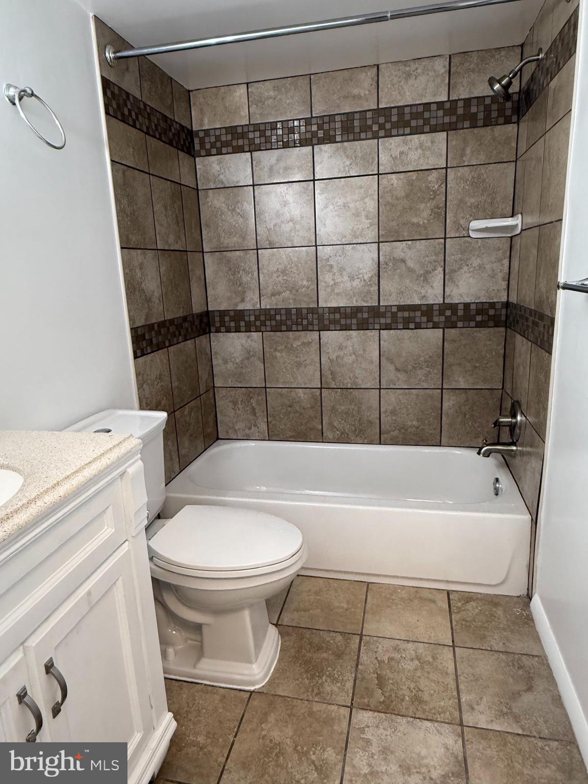 10244 Prince Place, Unit 21T3 Upper Marlboro, MD 20774 - Photo 34 of 64 a bathroom with a toilet a sink and bathtub