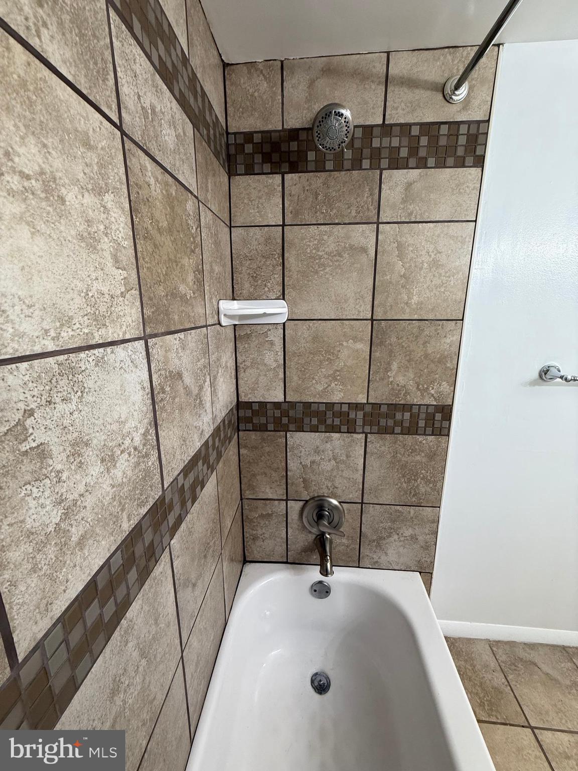 10244 Prince Place, Unit 21T3 Upper Marlboro, MD 20774 - Photo 35 of 64 a bathroom with a shower and a sink