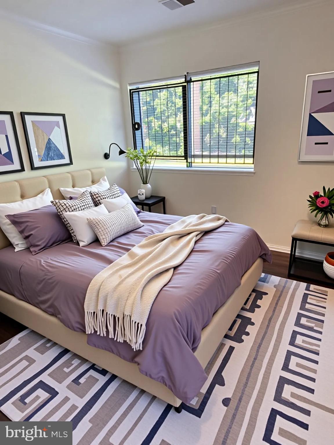 10244 Prince Place, Unit 21T3 Upper Marlboro, MD 20774 - Photo 36 of 64 a bedroom with bed and wooden floor