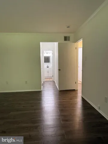 a view of a house with backyard and porch
