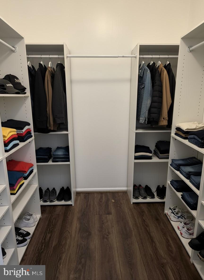 10244 Prince Place, Unit 21T3 Upper Marlboro, MD 20774 - Photo 42 of 64 a view of walk in closet with clothes and shoes