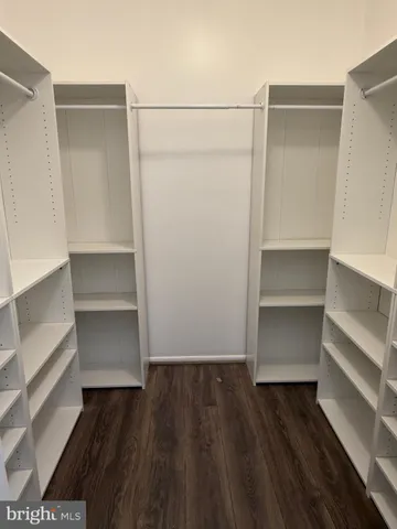 a view of outdoor space with signage and flags