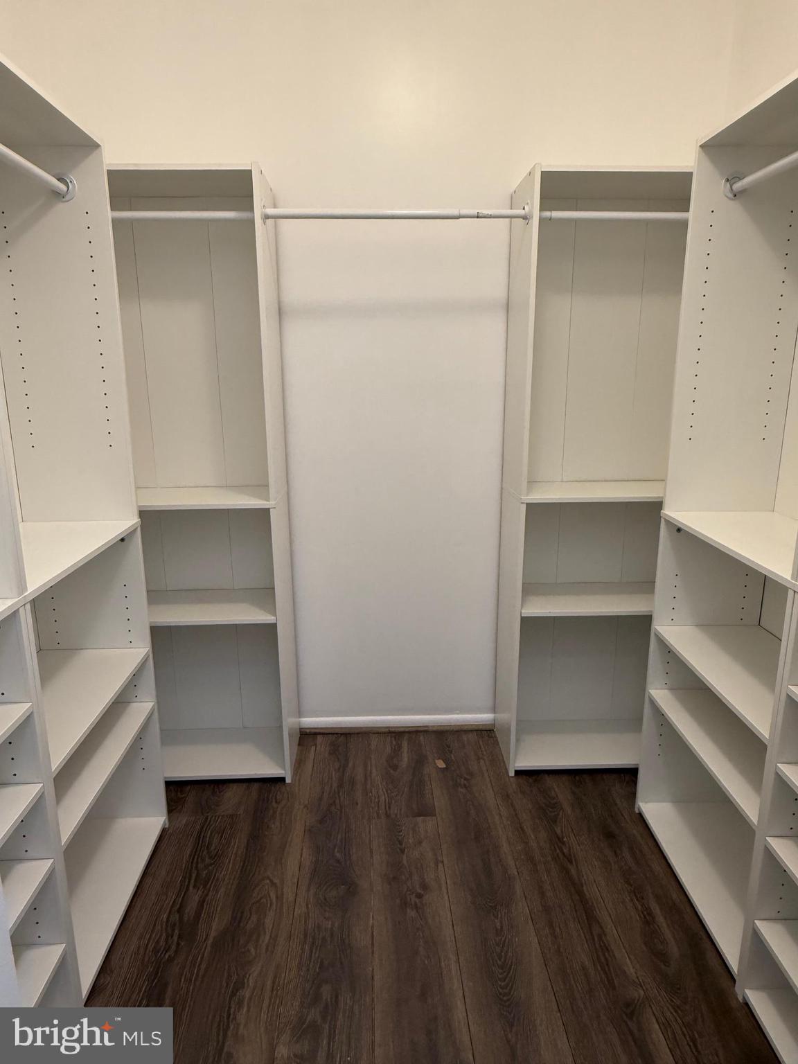 10244 Prince Place, Unit 21T3 Upper Marlboro, MD 20774 - Photo 43 of 64 a view of walk in closet with empty racks