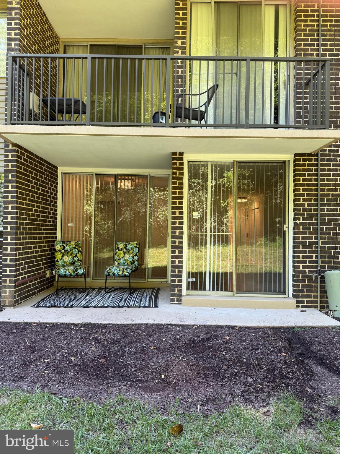 10244 Prince Place, Unit 21T3 Upper Marlboro, MD 20774 - Photo 50 of 64 a view of a house with a yard
