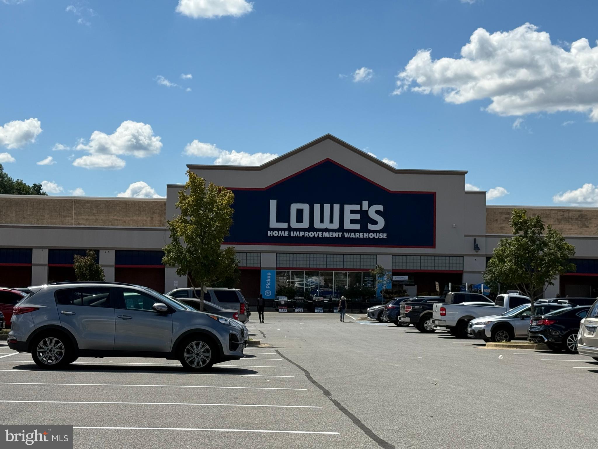 10244 Prince Place, Unit 21T3 Upper Marlboro, MD 20774 - Photo 57 of 64 a view of a car parked in front of a building