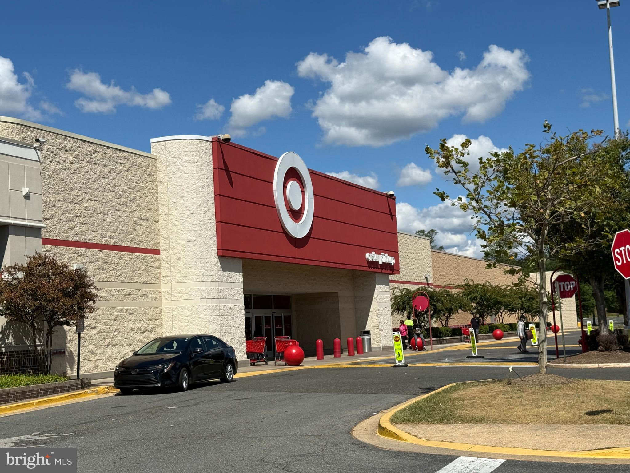 10244 Prince Place, Unit 21T3 Upper Marlboro, MD 20774 - Photo 61 of 64 a car parked in front of a building