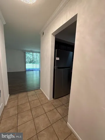 a kitchen with a sink a stove and a microwave oven