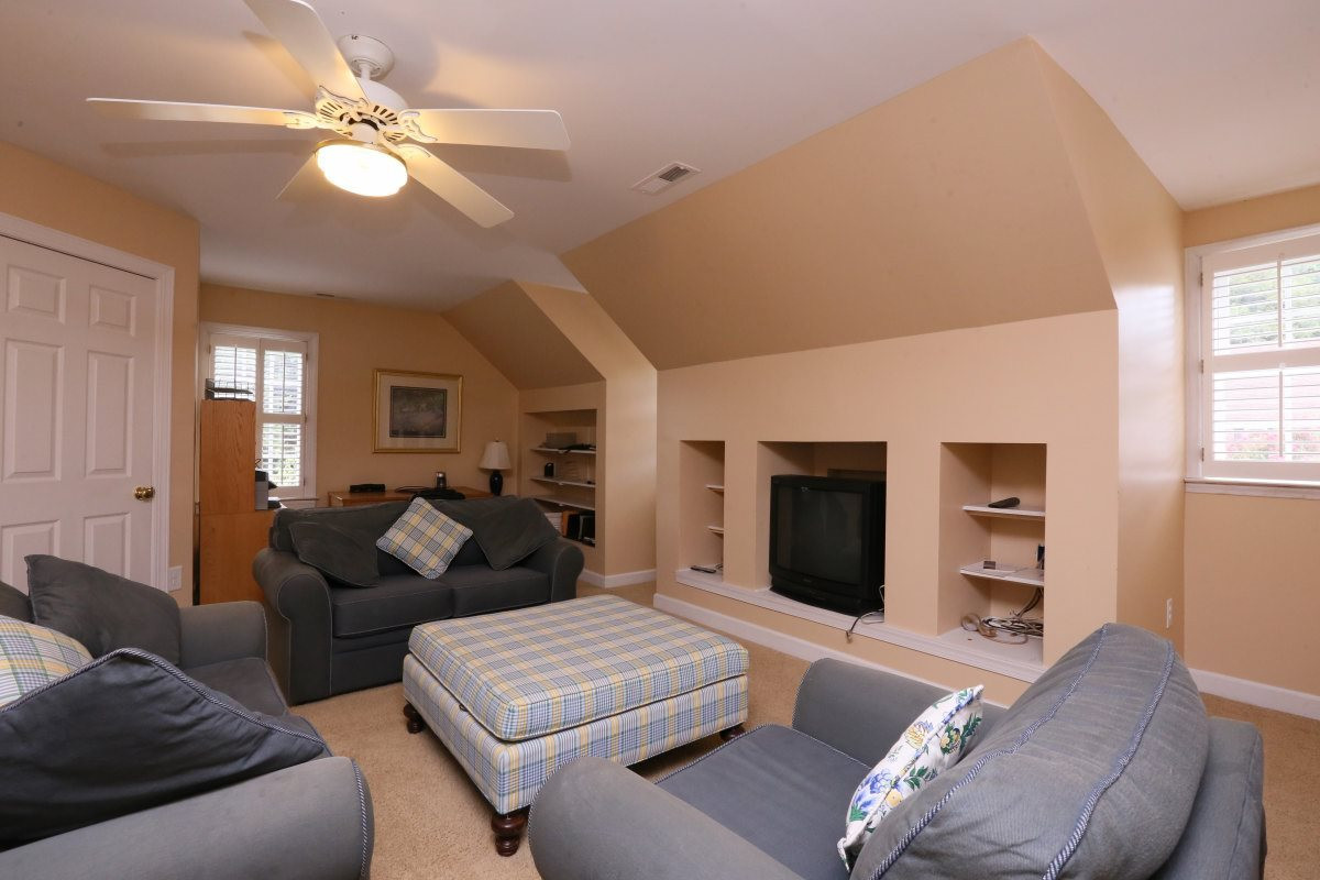 3200 Anderson Drive Raleigh, NC 27609 - Photo 21 of 25 Third floor bonus room with built-ins, storage and ample natural lighting. Bonus Room