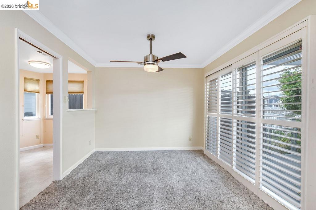 184 Pelican Loop Pittsburg, CA 94565 - Photo 13 of 56 a view of a livingroom with a ceiling fan and window