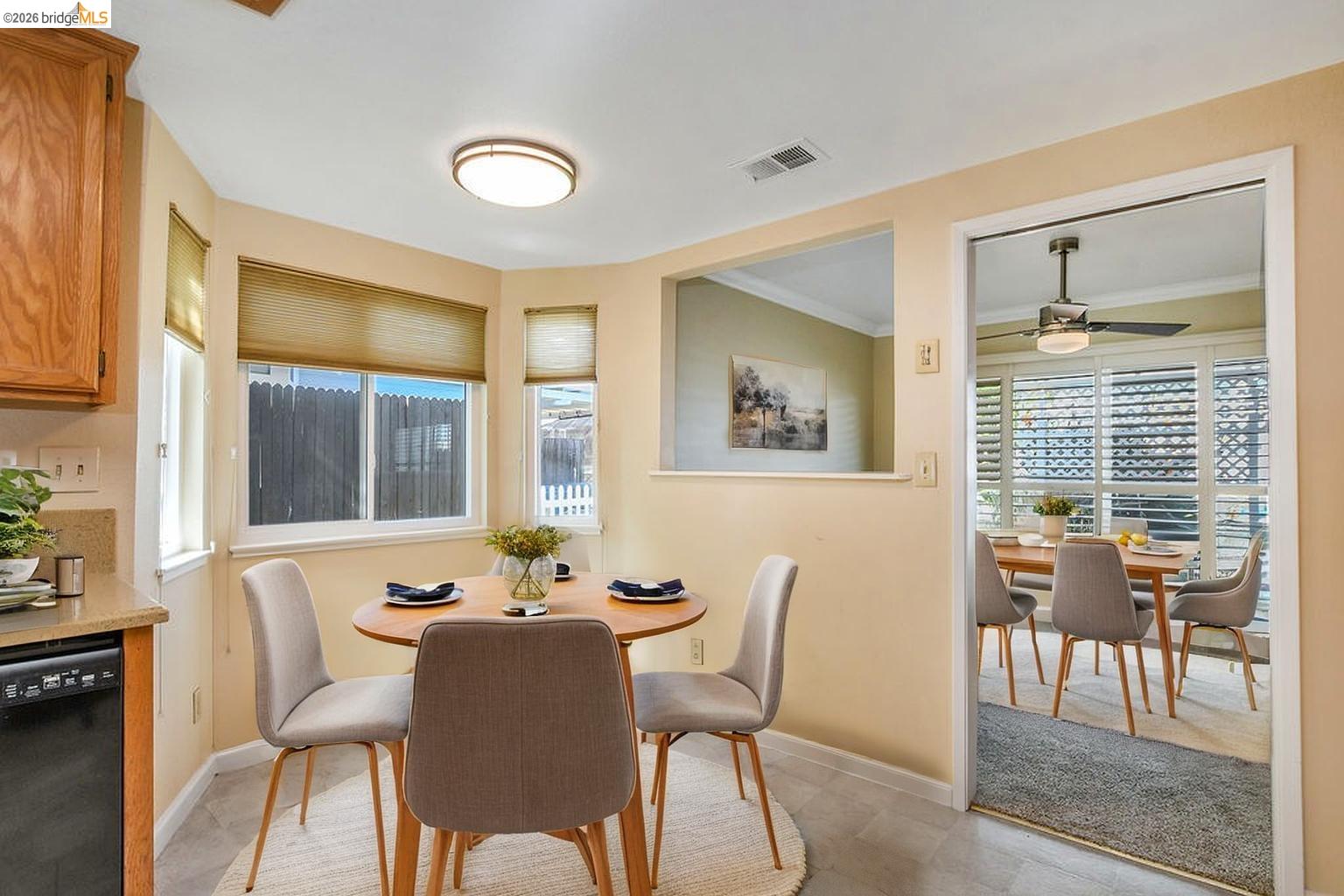 184 Pelican Loop Pittsburg, CA 94565 - Photo 17 of 56 a view of a dining room with furniture and windows
