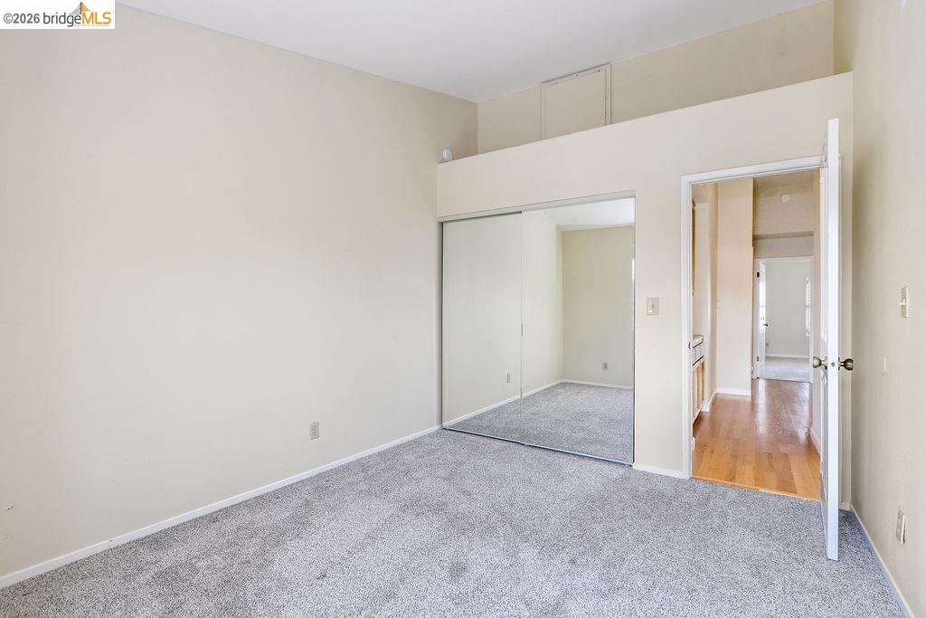 184 Pelican Loop Pittsburg, CA 94565 - Photo 26 of 56 Unfurnished bedroom with light colored carpet and a closet