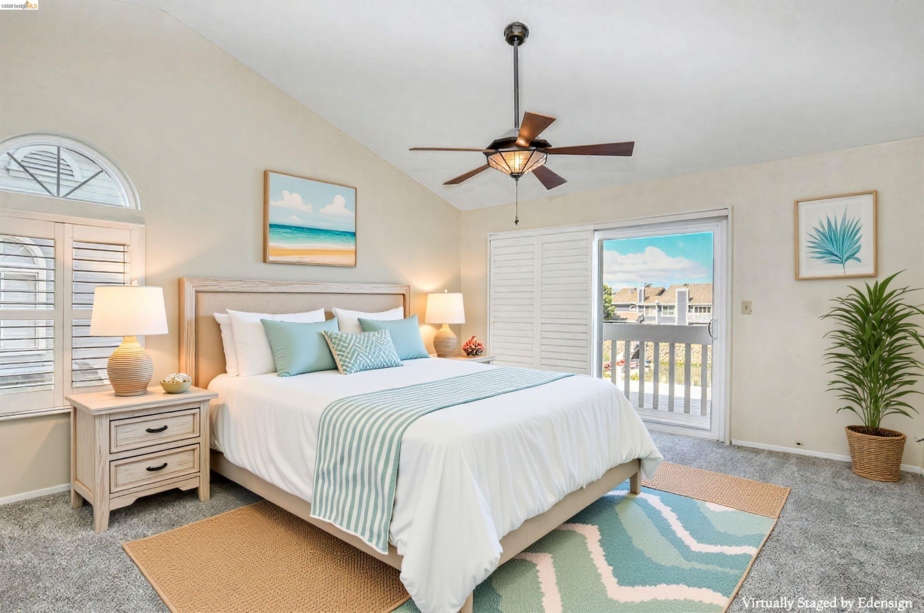 184 Pelican Loop Pittsburg, CA 94565 - Photo 36 of 56 a bedroom with a bed a chandelier and a window