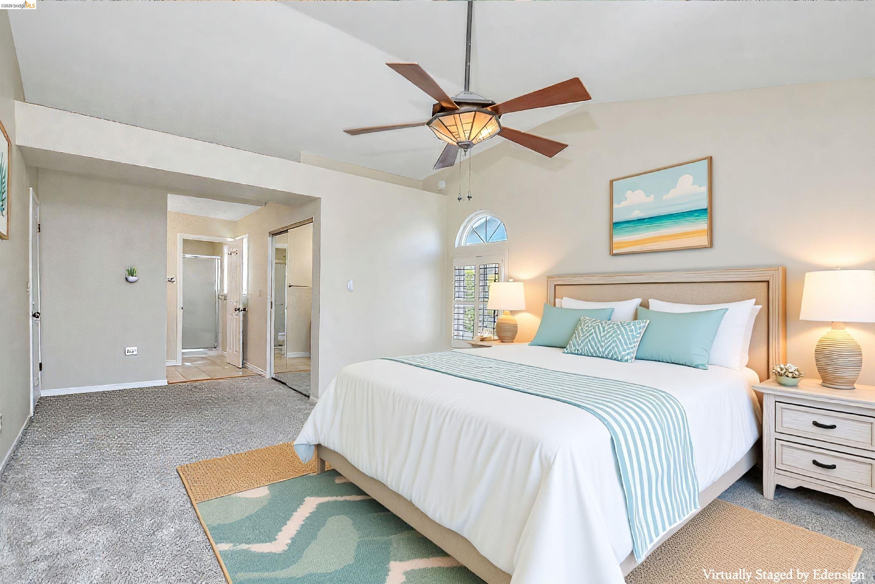184 Pelican Loop Pittsburg, CA 94565 - Photo 38 of 56 a bedroom with a bed and a chandelier