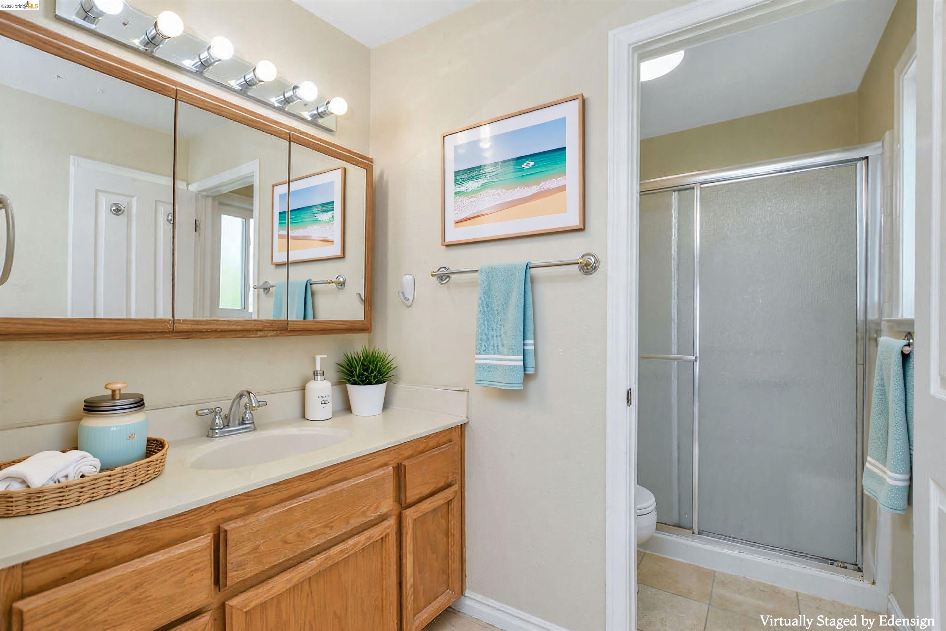 184 Pelican Loop Pittsburg, CA 94565 - Photo 40 of 56 a bathroom with a sink and a mirror
