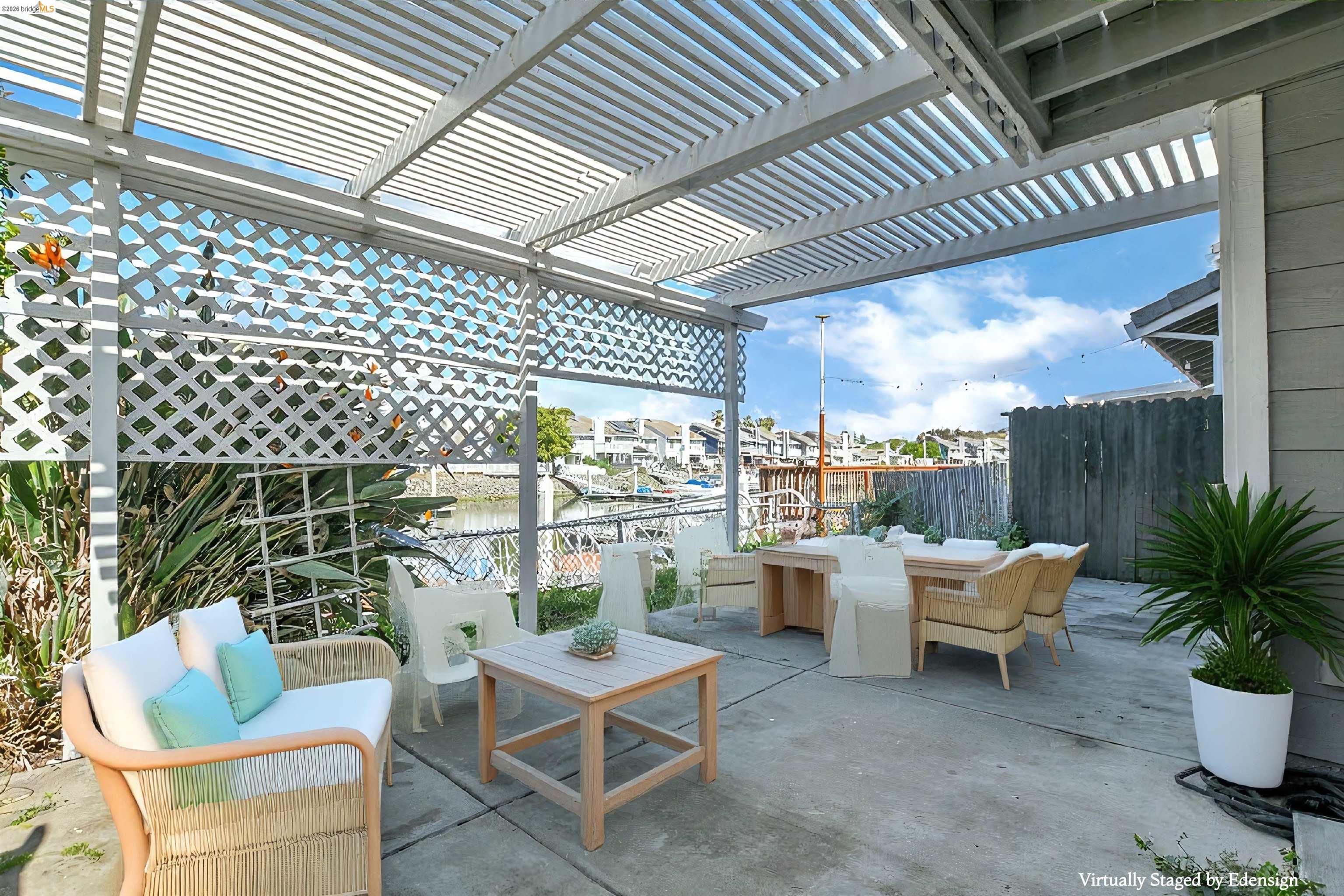 184 Pelican Loop Pittsburg, CA 94565 - Photo 43 of 56 a building outdoor space with patio furniture and potted plants