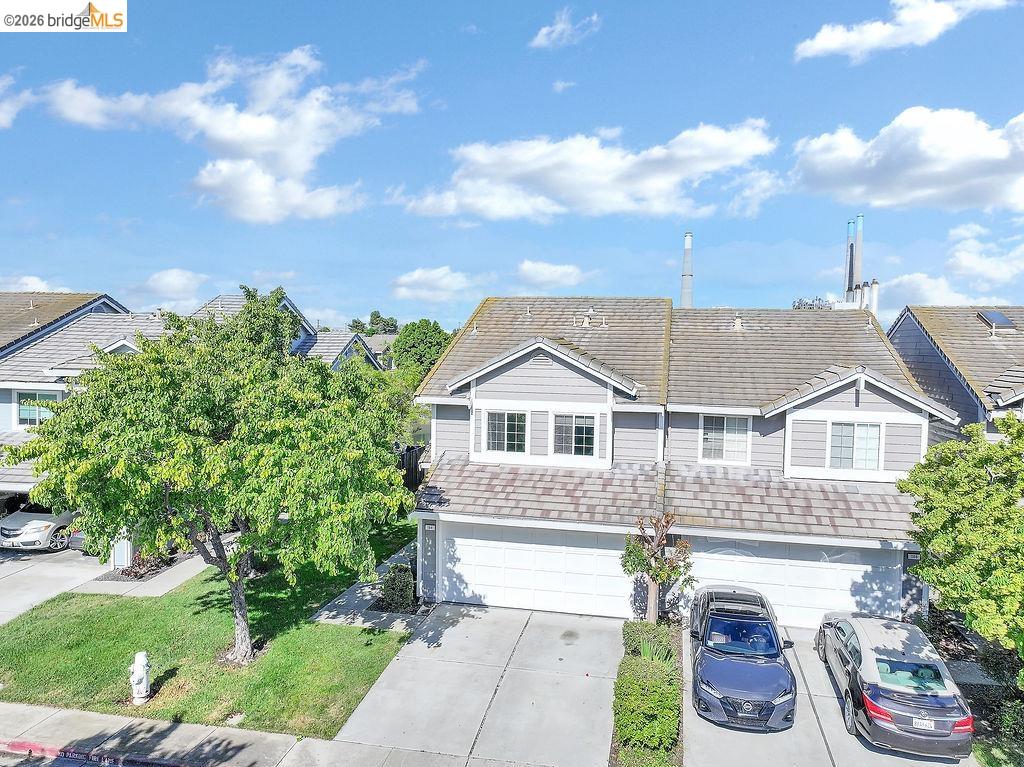 184 Pelican Loop Pittsburg, CA 94565 - Photo 6 of 56 a front view of a house with a yard