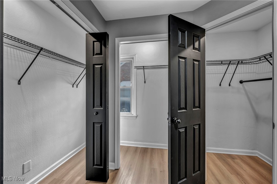 20202 Sumpter Road Cleveland, OH 44128 - Photo 22 of 46 Spacious closet featuring light wood-style flooring