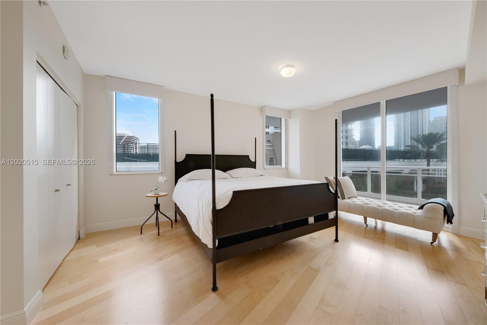 901 Brickell Key Boulevard, Unit 609 Miami, FL 33131 - Photo 6 of 27 Large Primary Bedroom with direct access to the balcony.