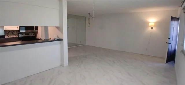 a view of a kitchen with a sink