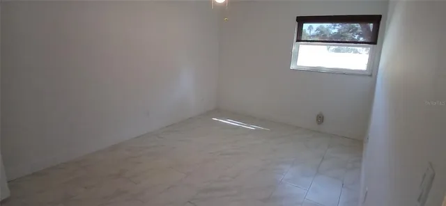 an empty room with a window