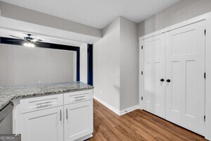 86 South Forest Avenue, Unit A Hartwell, GA 30643 - Photo 12 of 27 a view of a storage and utility room with wooden floor