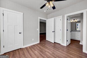 86 South Forest Avenue, Unit A Hartwell, GA 30643 - Photo 21 of 27 wooden floor in an empty room with a window