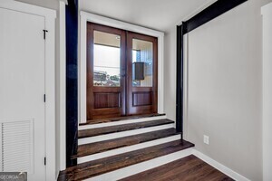 86 South Forest Avenue, Unit A Hartwell, GA 30643 - Photo 3 of 27 a view of entryway with wooden floor and front door
