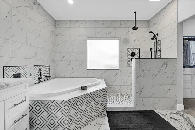 a bathroom with a sink and a bathtub