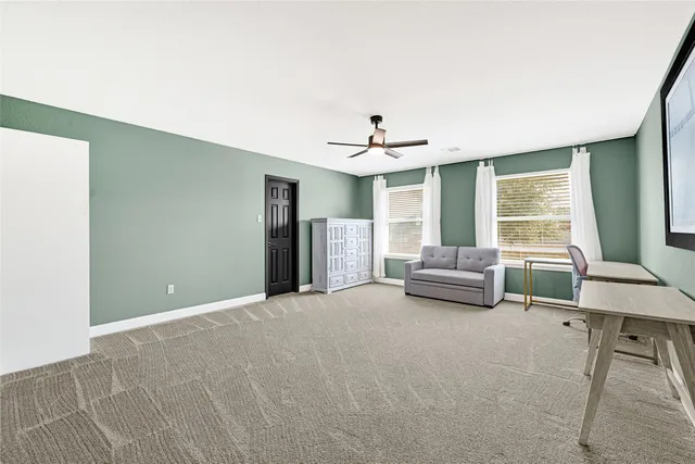 a bed room with a bed and a window