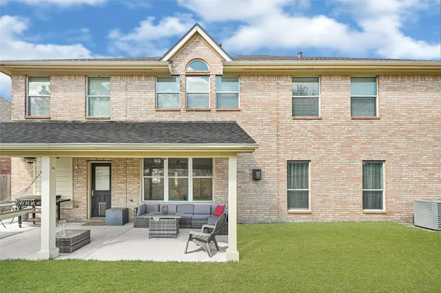 a view of a backyard of a house