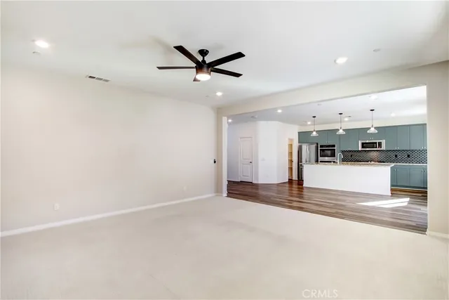 a view of a kitchen with a sink and dishwasher