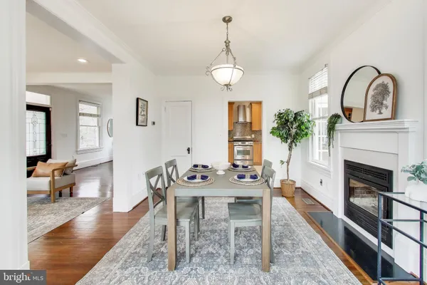 a view of a livingroom with furniture and fireplace