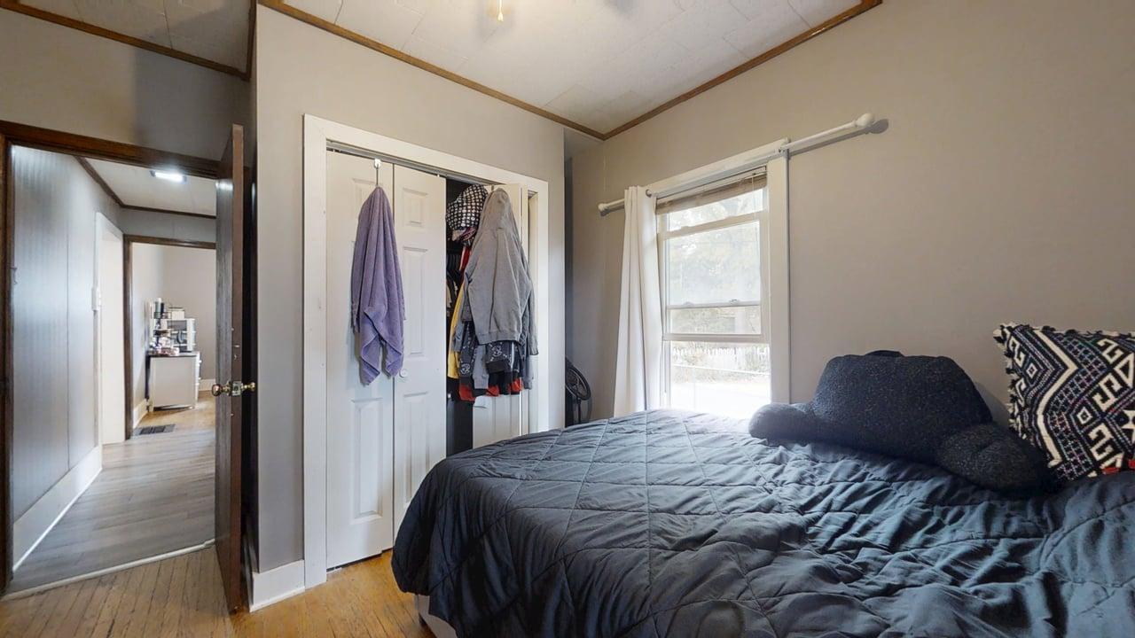 1311 West Hill Street Champaign, IL 61821 - Photo 15 of 25 a bedroom with a bed and a window