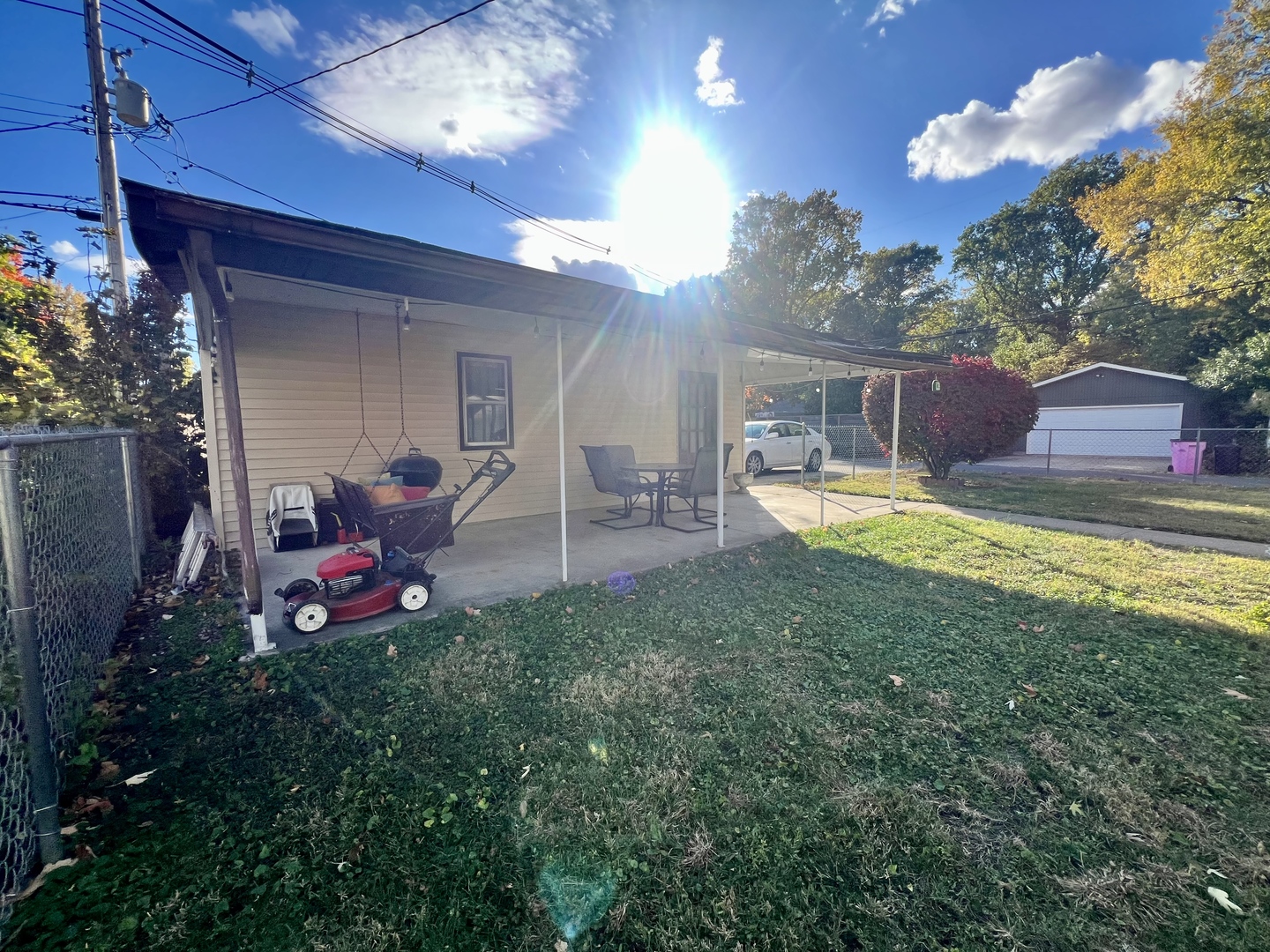 1311 West Hill Street Champaign, IL 61821 - Photo 21 of 25 a view of a house with backyard and sitting area